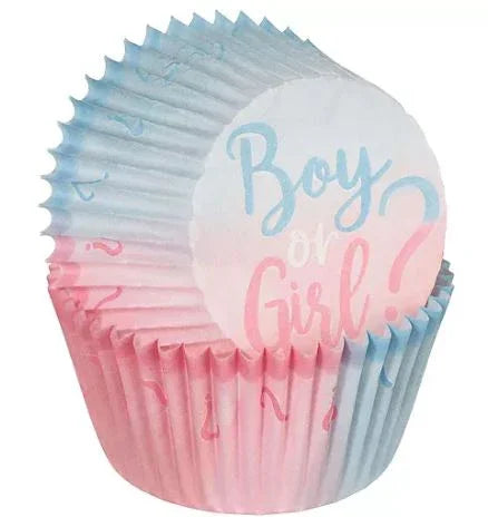 Cupcake liners with blue and pink pleated sides featuring "Boy or Girl" text on white circular toppers for gender reveal celebrations.