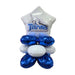 Stacked arrangement of four metallic blue foil balloons and one white foil balloon topped with a white t-shirt featuring the Titans Thunder Ridge logo in blue.