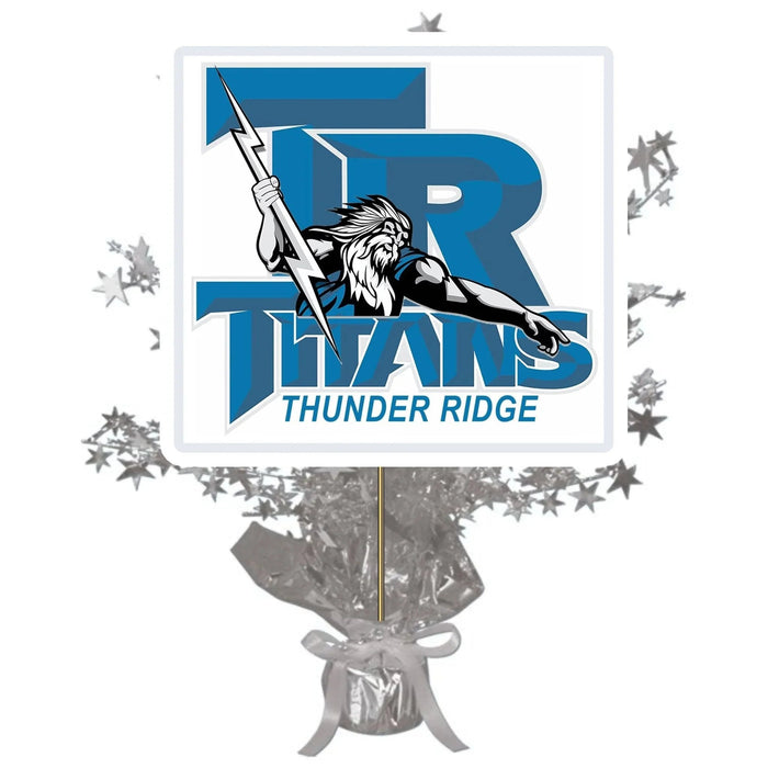 Thunder Ridge Titans school logo centerpiece spray featuring a blue and white design with a wizard mascot holding a lightning bolt, surrounded by silver star decorations on a clear base.