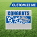 Graduation-themed customizable sign with 'Congrats Grad 2026' text on a grass background
