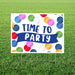 Colorful yard sign with "TIME TO PARTY" text on a dark blue banner, surrounded by red, blue, pink, green, yellow, and white balloons on a white background.