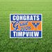 Timpview High School graduation yard sign with blue and orange horizontal stripes, white "CONGRATS Grad 2026 TIMPVIEW" text, and school logo, displayed on grass.