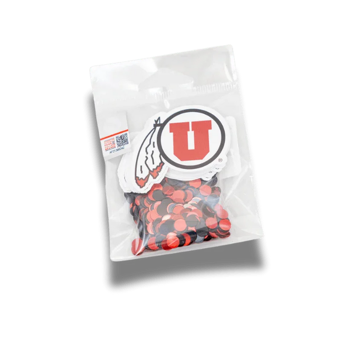 Clear plastic package containing red and black confetti pieces with a white label featuring a red "U" logo and feather design at the top.