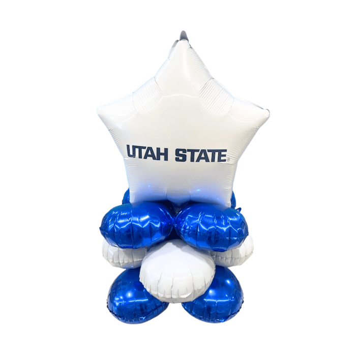 White star-shaped foil balloon with "Utah State" text, supported by four blue metallic round balloons and one white metallic balloon at the base.