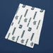 White vinyl table runner with repeating blue logo and text pattern displayed folded on a dark blue background.
