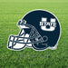 Navy blue football helmet-shaped yard sign with white striping and a "U STATE" logo, mounted on a metal stake in grass.
