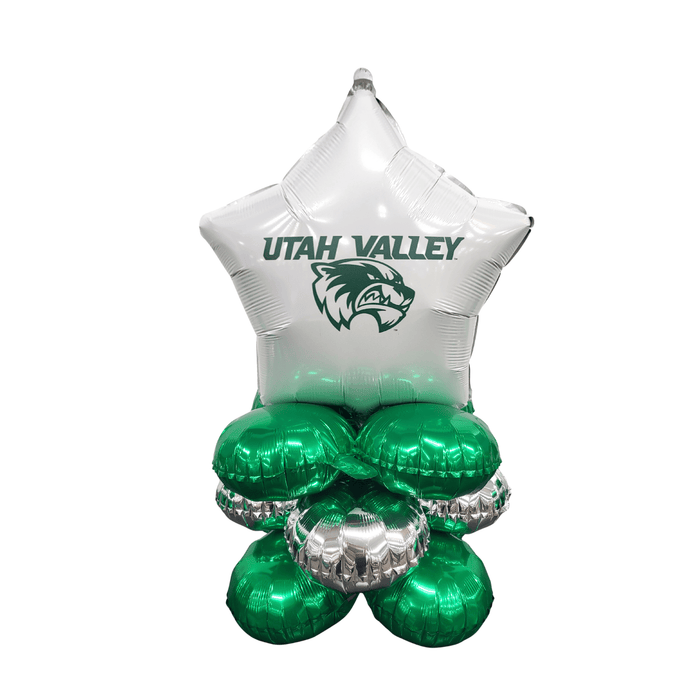 White star-shaped foil balloon with Utah Valley logo and green cougar head, positioned above four green metallic round balloons with silver trim at the base.