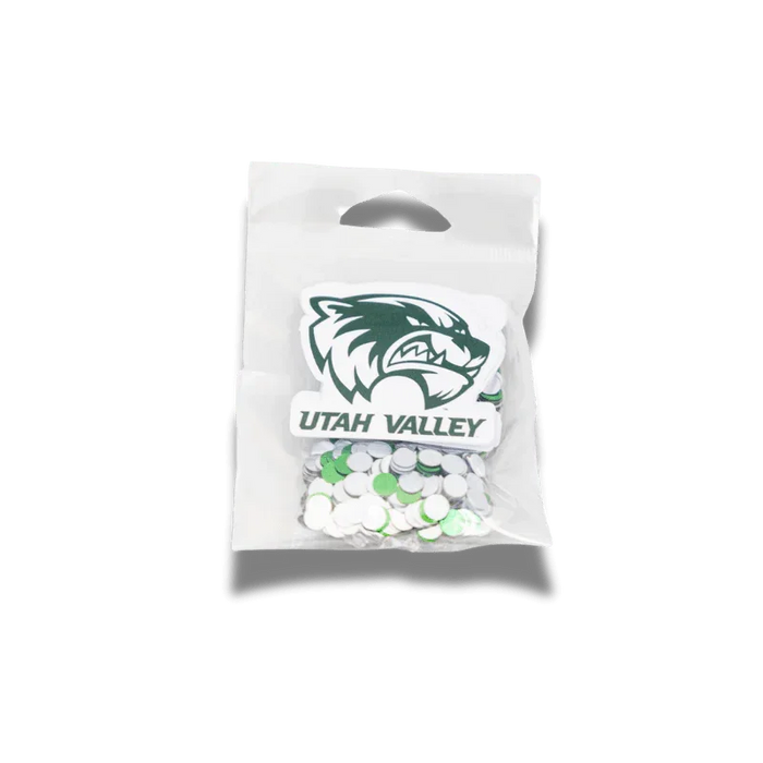 Clear plastic bag with a die-cut Utah Valley Wolverine logo label containing approximately 24 white and green circular confetti pieces.
