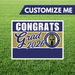 Graduation-themed customizable sign with 'Congrats Grad 2026' text on a grass background