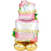 Tall tiered wedding cake foil balloon with pink roses, gold decorative trim, "Wedding Wishes" text, pink and white striped details, and gold base balloons.