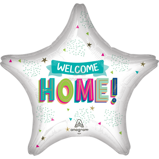 Silver star-shaped mylar balloon with colorful "Welcome Home" text in pink, green, and blue letters, decorated with a teal banner, confetti dots, and small triangle and star embellishments.