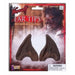 Pair of dark brown pointed ear tips displayed on a retail package with werewolf-themed artwork and warning label.