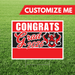 Graduation-themed customizable sign with 'Congrats Grad 2026' on a grass background