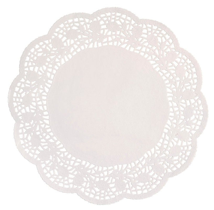 White lace doilies with an intricate openwork floral pattern and scalloped edges arranged in a circular shape.