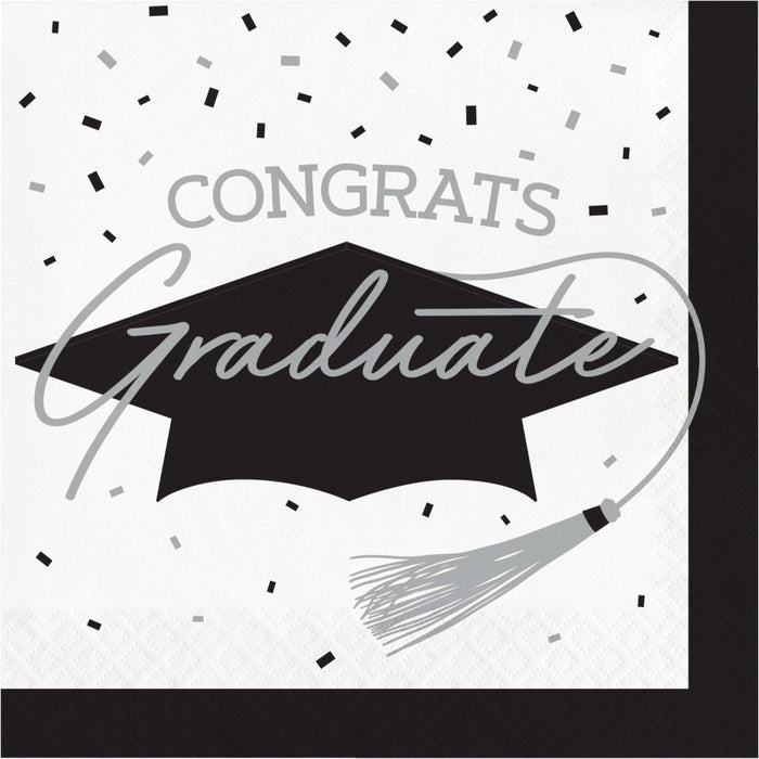 White paper napkins with black graduation cap design, gray "Congrats Graduate" text, confetti, and tassel illustration, pack of 36.