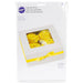 Wilton white cupcake boxes with clear viewing windows displaying yellow frosted cupcakes with sprinkles, includes three boxes holding four cupcakes each.