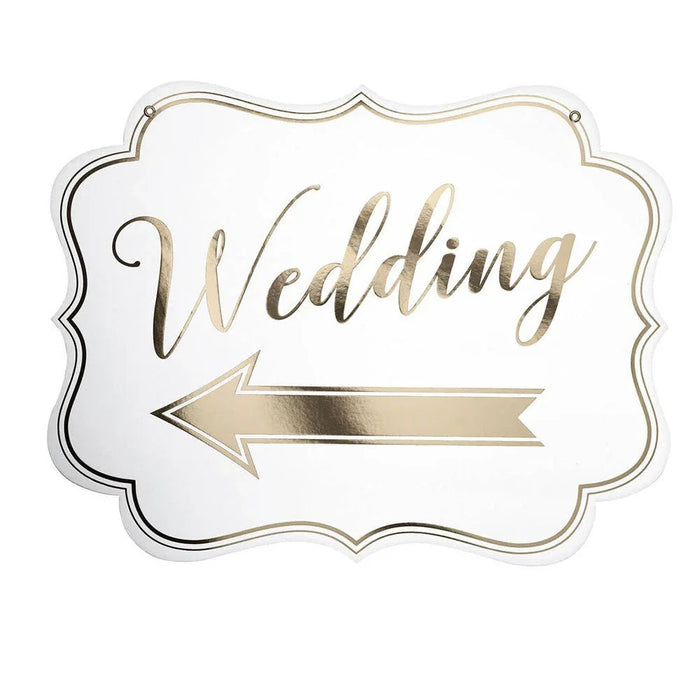 White decorative sign with scalloped edges featuring gold cursive text reading "Wedding" and a gold arrow banner on a white background.