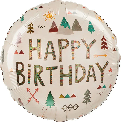 Round cream-colored mylar balloon with "HAPPY BIRTHDAY" in decorative patterned letters surrounded by illustrated trees, mountains, arrows, sun, and geometric designs in green, red, brown, and gold tones.