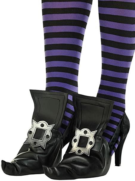 Black witch shoe covers with silver buckle details worn over purple and black striped stockings.