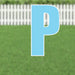 Bright blue letter P yard sign with white outline and metal stakes, displayed on grass with white picket fence background.