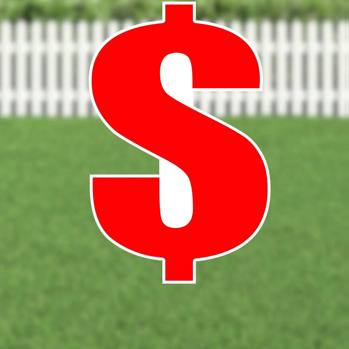 Red dollar sign yard card with white outline displayed on grass with white fence in background.